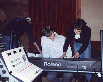 Carolyne showing Joe Terry a piano part. With her hands busy, she puts money for a food delivery in her mouth! Carolyne showing Joe Terry a piano part. With her hands busy, she puts money for a food delivery in her mouth!
