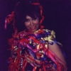 Carolyne says this was, "The end of the German tour in Dec. 1990. They released confetti and streamers during the encore, 'Come Together.' I wore my Tina Turner wig. That wig was funny. No one recognized me and it made men nervous. Ah, the power of hair!"